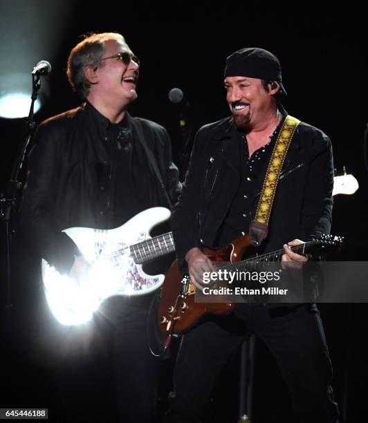 Bassist Hugh McDonald of Bon Jovi performs with guitarist/producer John Shanks at T-Mobile Arena on February 25, 2017 in Las Vegas, Nevada.