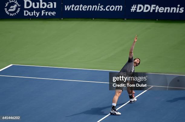 Andy Murray of United Kingdom stretches during his practice session ahead of the ATP Dubai Duty Free Tennis Championship on February 26, 2017 in...