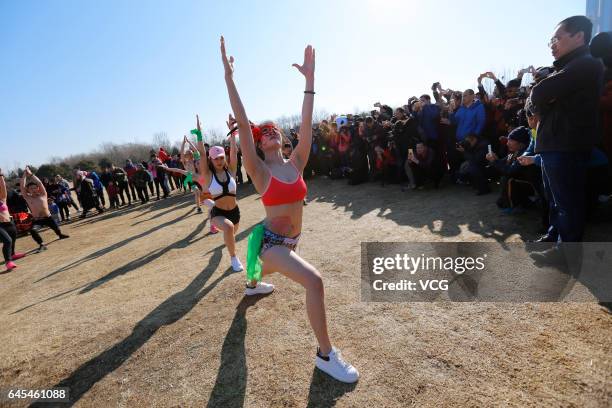 Participants pose during 6th The Pig Run at Olympic Forest Park on February 26, 2017 in Beijing, China.