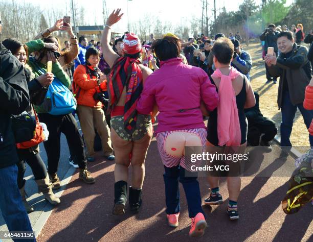 Participants compete in 6th The Pig Run at Olympic Forest Park on February 26, 2017 in Beijing, China.