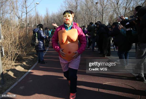 Participants compete in 6th The Pig Run at Olympic Forest Park on February 26, 2017 in Beijing, China.
