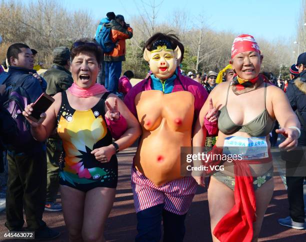 Participants compete in 6th The Pig Run at Olympic Forest Park on February 26, 2017 in Beijing, China.