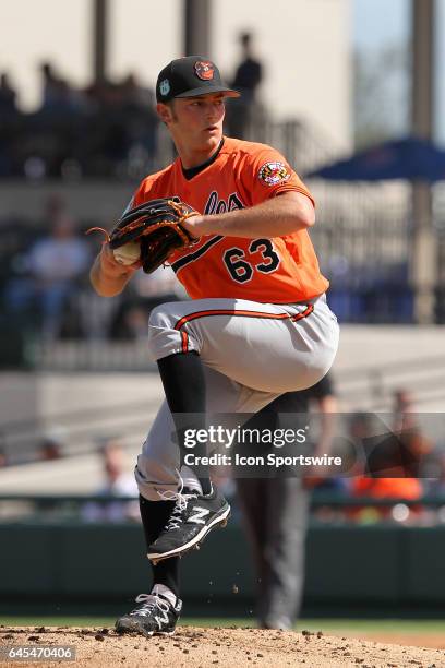 Tyler Wilson of the Orioles delivers a pitch to the plate during the spring training game between the Baltimore Orioles and the Detroit Tigers on...