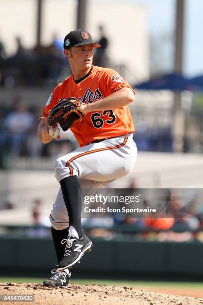 Tyler Wilson of the Orioles delivers a pitch to the plate during the spring training game between the Baltimore Orioles and the Detroit Tigers on...