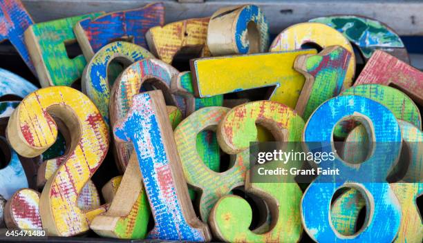 wooden numbers. - numerato foto e immagini stock