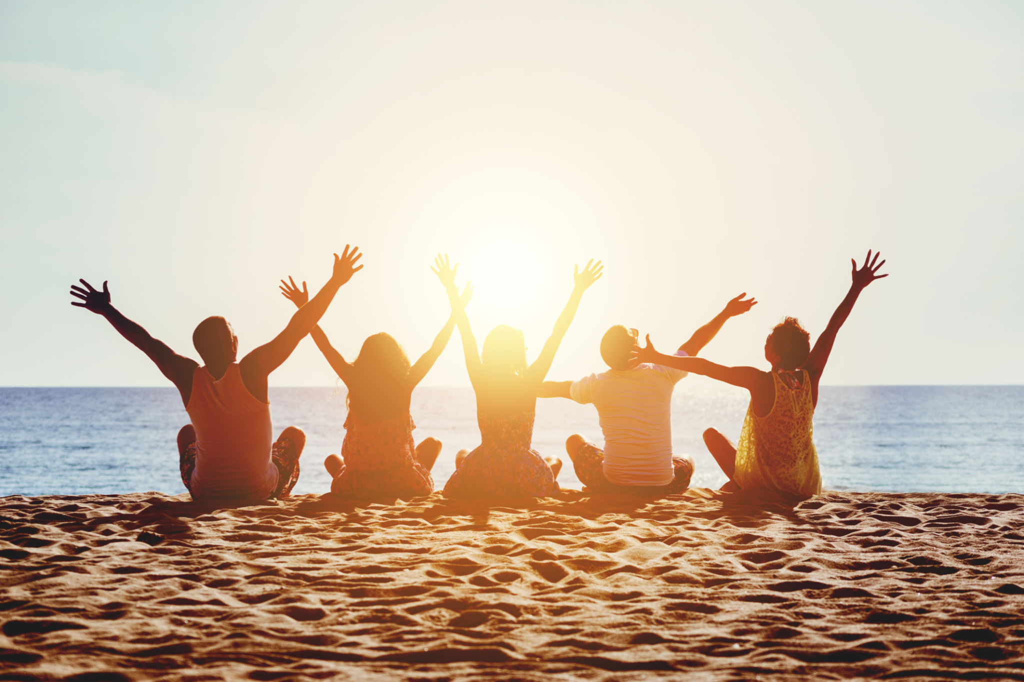 Group happy people beach sea sunset concept Group happy people beach sea sunset concept
