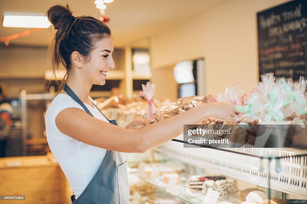 Arranging cookies in the bakery