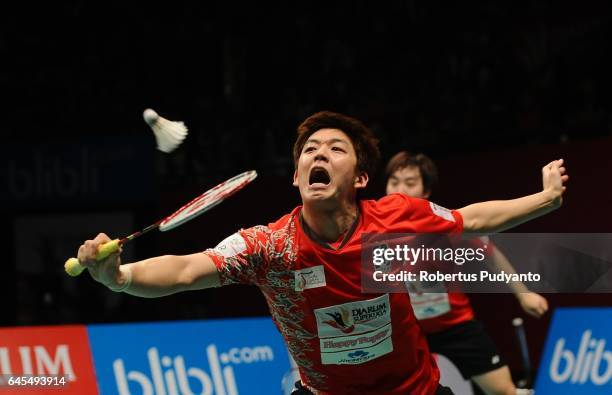 Sa Rang Kim and Lee Yong Dae of Musica Champions Indonesia compete against Sung Hyun Ko and Baek Cheol Shin of PB Djarum Indonesia during the Mens...