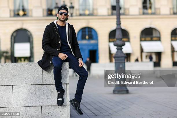 Anil Brancaleoni, Youtube influencer known as Wartek and blogger, wears Puma black shoes, Replay black denim jeans pants, a Gant blue pull over, a...