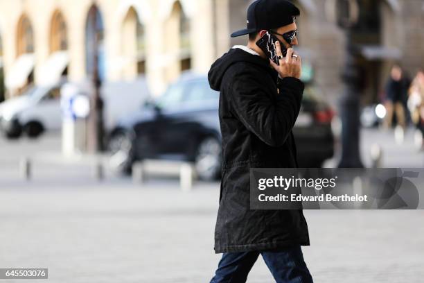 Anil Brancaleoni, Youtube influencer known as Wartek and blogger, wears Puma black shoes, Replay black denim jeans pants, a Gant blue pull over, a...