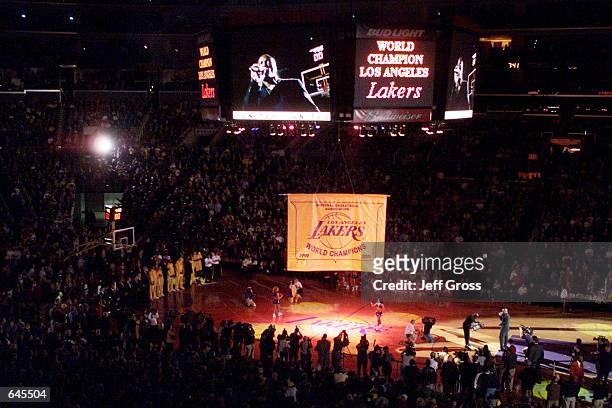 The Los Angeles Lakers'' Championship banner is lowered from the Jumbo Tron prior to their game against the Utah Jazz at Staples Center in Los...