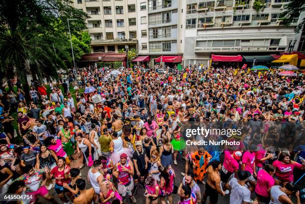 Revellers dance as they take part in the annual carnival block &quot;Minhoqueens&quot; of the Arouche in Sao Paulo, Brazil, February 25, 2017.