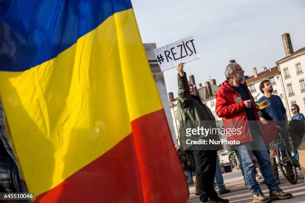People protest against political corruption in France and Romania in Lyon, southern France on February 19, 2017.