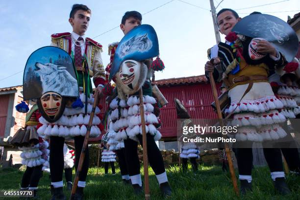 Several young men dressed in the typical costume of Felo wait to start at the rural carnival of Maceda Spain, on 25 February 2017. This carnival or...