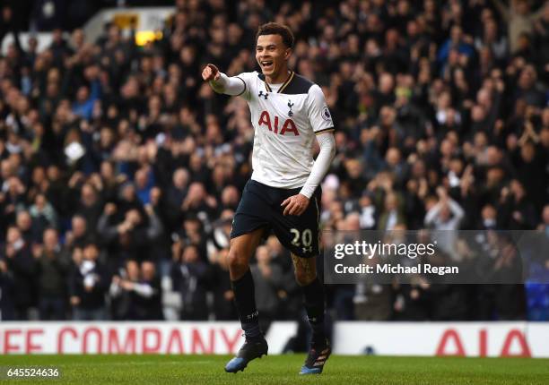 Dele Alli of Tottenham Hotspur celebrates scoring his teams fourth goal during the Premier League match between Tottenham Hotspur and Stoke City at...