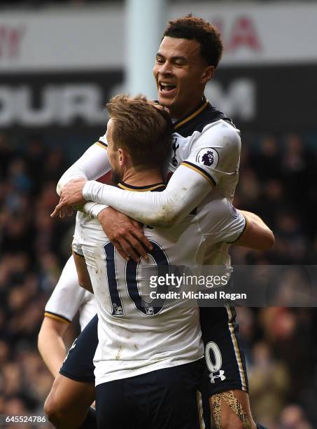 Dele Alli of Tottenham Hotspur celebrates scoring his teams fourth goal with teammate Harry Kane during the Premier League match between Tottenham...