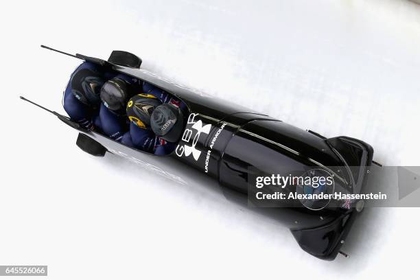 Pilot Lamin Deen of Great Britain competes with Ben Simons, John Baines and Andrew Matthews at the third run of the IBSF World Championships Bob &...