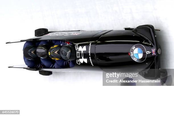 Pilot Lamin Deen of Great Britain competes with Ben Simons, John Baines and Andrew Matthews at the third run of the IBSF World Championships Bob &...