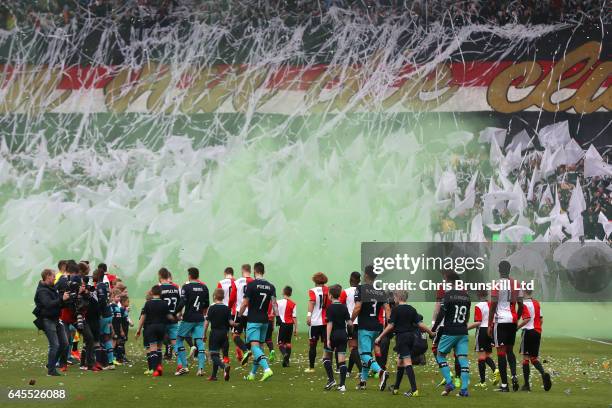 The two team walk out ahead of the Dutch Eredivisie match between Feyenoord and PSV Eindhoven at De Kuip on February 26, 2017 in Rotterdam,...