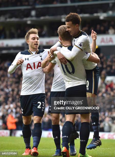 Tottenham Hotspur's English midfielder Dele Alli celebrates with Tottenham Hotspur's English striker Harry Kane after scoring their fourth goal...