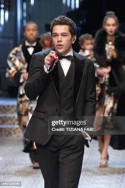 Singer Austin Mahone performs during the show for fashion house Dolce & Gabbana during the Women's Fall/Winter 2017/2018 fashion week in Milan, on...