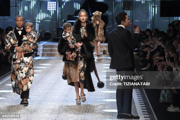 Singer Austin Mahone performs during the show for fashion house Dolce & Gabbana during the Women's Fall/Winter 2017/2018 fashion week in Milan, on...