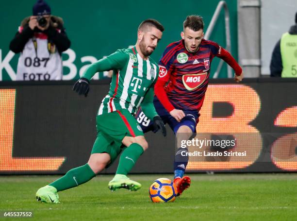 Endre Botka of Ferencvarosi TC competes for the ball with Asmir Suljic of Videoton FC during the Hungarian OTP Bank Liga match between Ferencvarosi...