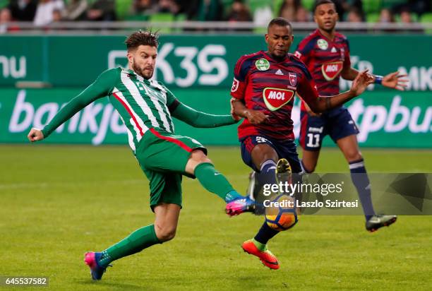 Marco Djuricin of Ferencvarosi TC competes for the ball with Paulo Vinicius of Videoton FC in front of Loic Nego of Videoton FC during the Hungarian...