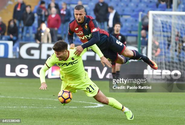 Armando Izzo of Genoa and Bruno Petkovic of Bologna in action during the Serie A match between Genoa CFC and Bologna FC at Stadio Luigi Ferraris on...