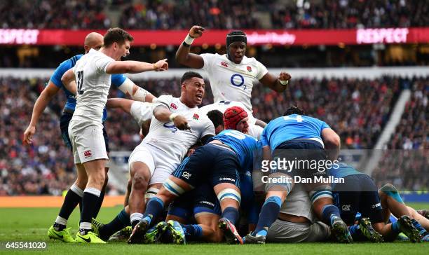 England players Owen Farrell, Nathan Hughes and Maro Itoje of England celebrate the opening try scored by Dan Cole during the RBS Six Nations match...