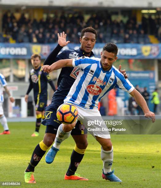 Jonathan De Guzman of ChievoVerona competes with Gianluca Caprari of Pescara Calcio during the Serie A match between AC ChievoVerona and Pescara...