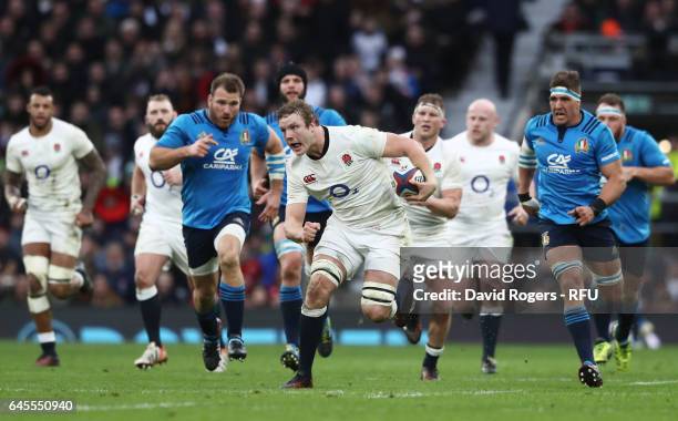 Joe Launchbury of England makes a break during the RBS Six Nations match between England and Italy at Twickenham Stadium on February 26, 2017 in...