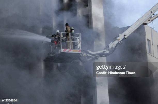 Massive fire breaks out at the Times of India building in Bahadur Shah Zafar Marg, on February 26, 2017 in New Delhi, India. 31 fire tenders were...