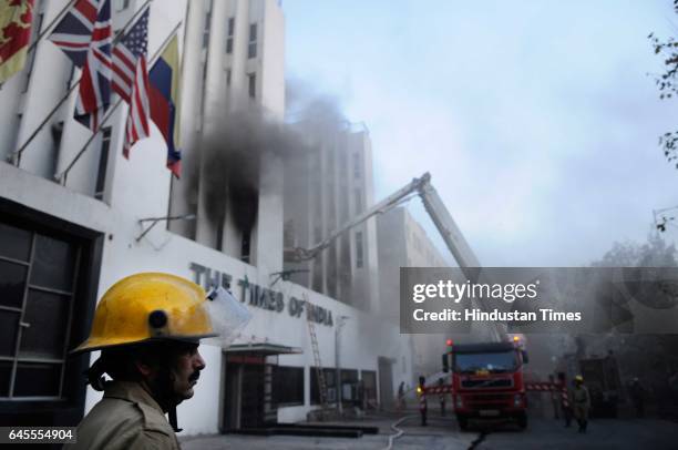 Massive fire breaks out at the Times of India building in Bahadur Shah Zafar Marg, on February 26, 2017 in New Delhi, India. 31 fire tenders were...