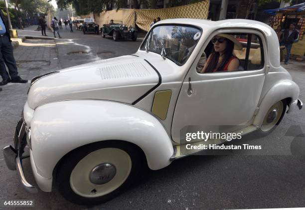 People participate with Fiat 500c 1952 Years of manufacture oldest 500cc car during the 51th Statesman Vintage and Classic Car Rally, on February 26,...