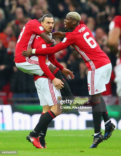 Zlatan Ibrahimovic of Manchester United celebrates with Eric Bailly and Paul Pogba as he scores their first goal during the EFL Cup Final match...