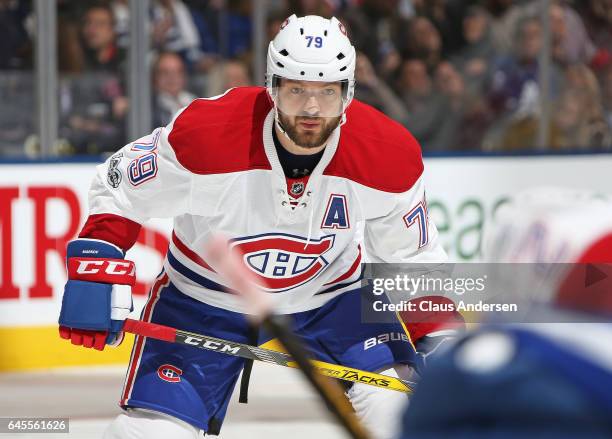 Andrei Markov of the Montreal Canadiens waits for a faceoff against the Toronto Maple Leafs during an NHL game at the Air Canada Centre on February...