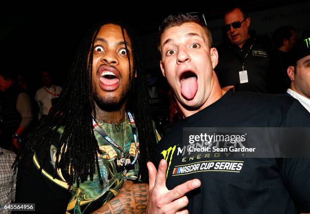 Rapper Waka Flocka Flame poses with New England Patriots tight end Rob Gronkowski prior to the 59th Annual DAYTONA 500 at Daytona International...