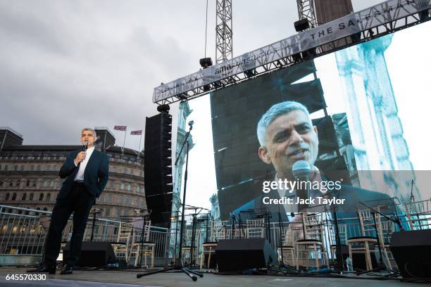 London Mayor Sadiq Khan addresses the crowd as thousands gather to watch a free screening and UK premier of Iranian film The Salesman in Trafalgar...