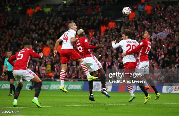 Oriol Romeu of Southampton heads the ball against the crossbar during the EFL Cup Final match between Manchester United and Southampton at Wembley...