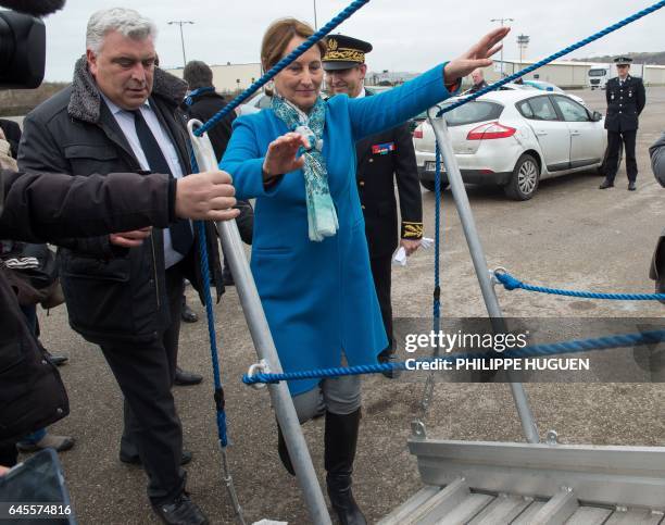 French Environment Minister Segolene Royal and French socialist lawmaker and Boulogne-sur-Mer mayor Frederic Cuvillier board a diesel-electric hybrid...