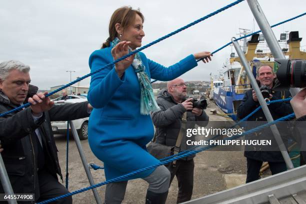 French Environment Minister Segolene Royal and French socialist lawmaker and Boulogne-sur-Mer mayor Frederic Cuvillier board a diesel-electric hybrid...