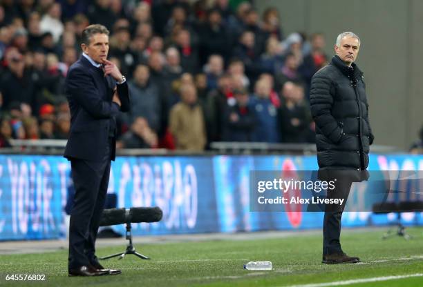 Claude Puel manager of Southampton and Jose Mourinho manager of Manchester United look on during the EFL Cup Final match between Manchester United...