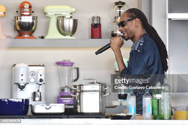 Snoop Dogg participates in a cooking demonstration at Goya Foods' Grand Tasting Village Featuring Mastercard Grand Tasting Tents & KitchenAid...