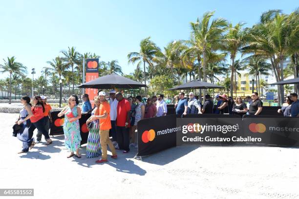 Guests line up for Goya Foods' Grand Tasting Village Featuring Mastercard Grand Tasting Tents & KitchenAid Culinary Demonstrations on February 25,...