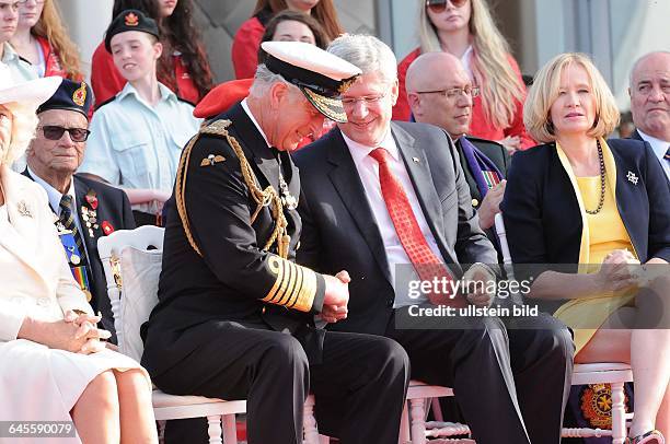 June 6 Courseulles, Normandy, France. Prince Charles, his wife Camilla, and the prime minister of Canada Stephen Harper, are visiting the location...