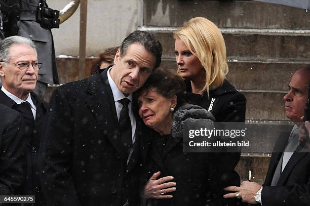 January 6 New York, NY, USA. Andrew Cuomo and his mother at the funeral. Mourners have gathered at Loyola church in upper Manhattan, New York, at the...