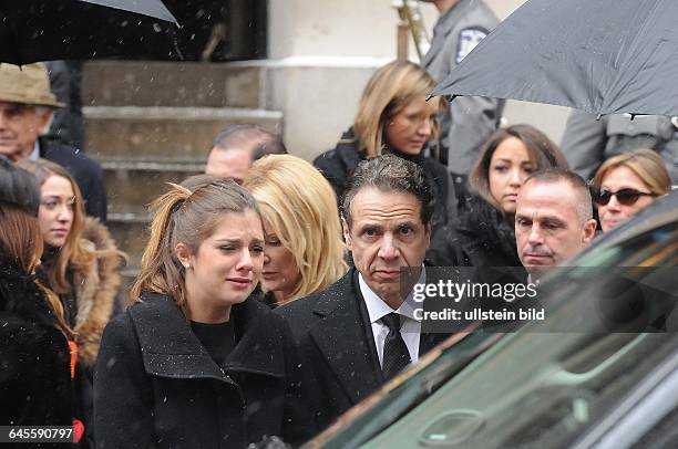 January 6 New York, NY, USA. Governor Andrew Cuomo surrounded by his family are leaving the church. Mourners have gathered at Loyola church in upper...