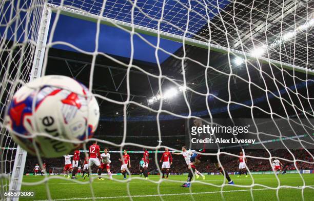 Manolo Gabbiadini of Southampton scores their second goal past goalkeeper David De Gea of Manchester United during the EFL Cup Final match between...