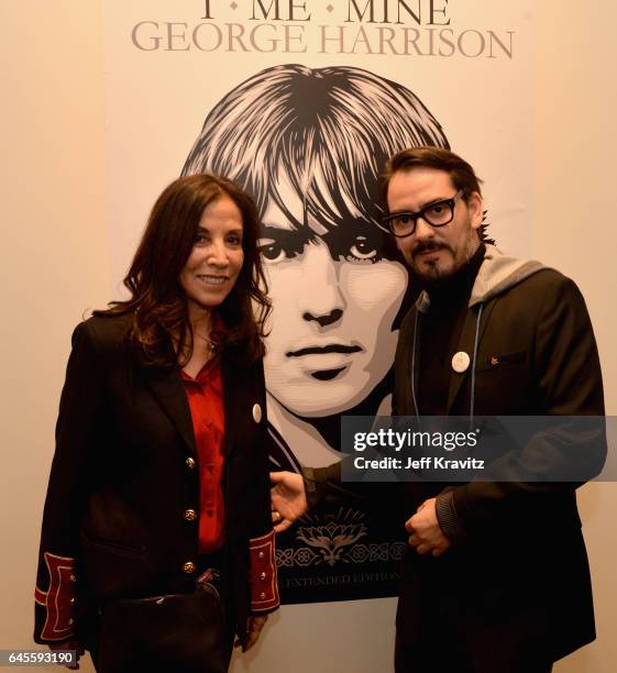 Author Olivia Harrison and singer-songwriter Dhani Harrison attend the "I ME MINE" George Harrison book launch at Subliminal Projects Gallery on...